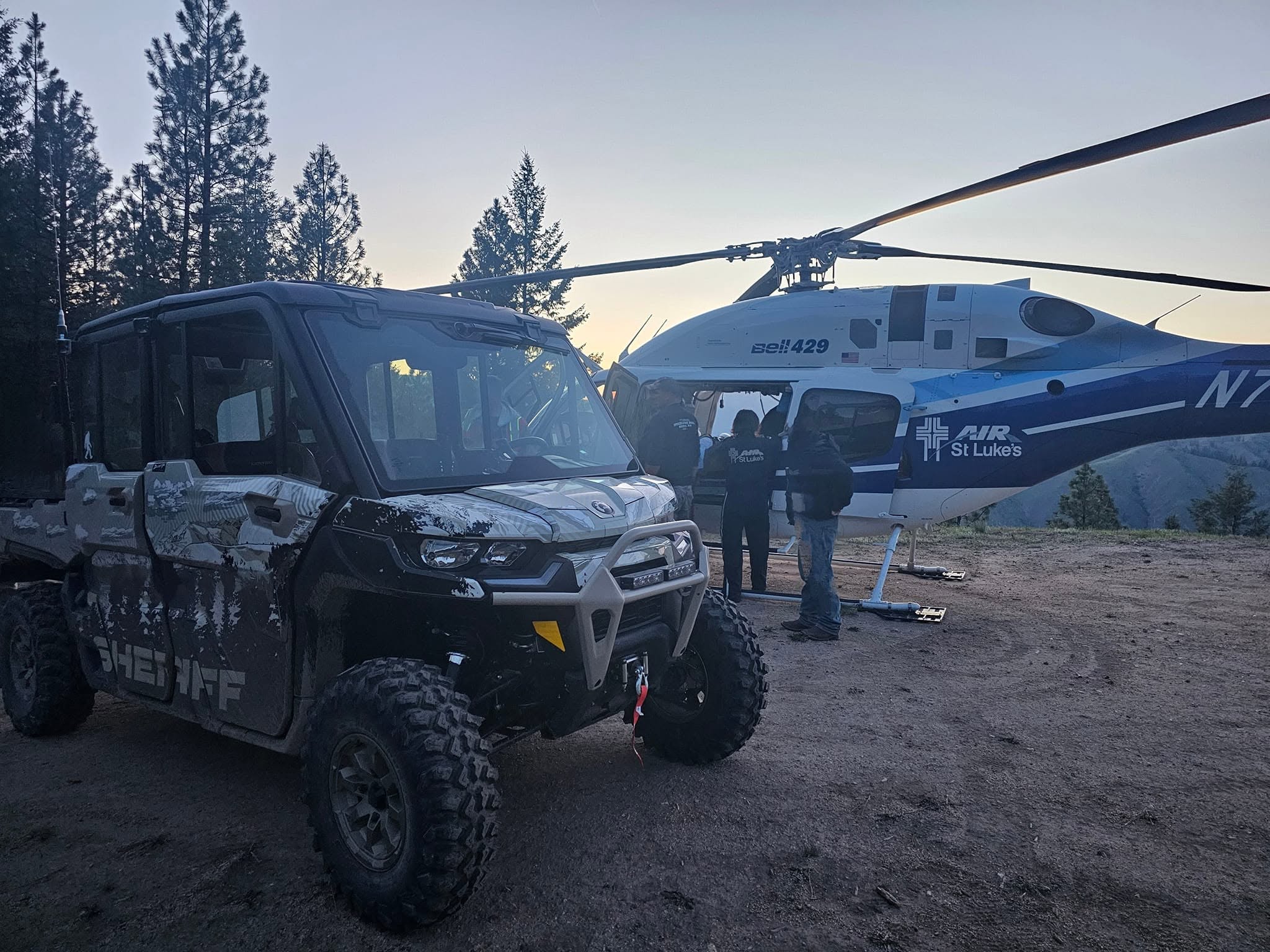 Boise County Search and Rescue UTV alongside a helicopter during an operation